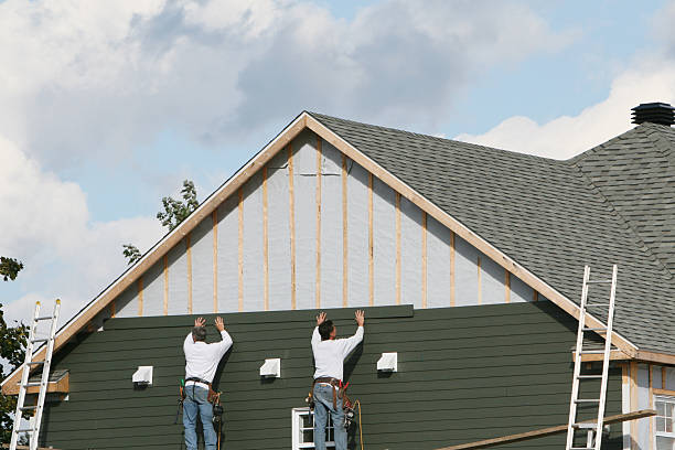 Professional Siding Installation technician working in Montgomery, GA